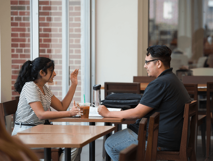 Two students having discussion in Danna Center